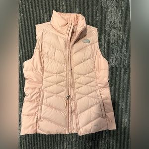 Light pink North Face vest, size medium, never worn.